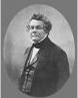 Portrait ovale en noir et blanc d'Isaac Adolphe Crémieux, un homme d'âge mûr portant des lunettes et une cravate sombre.